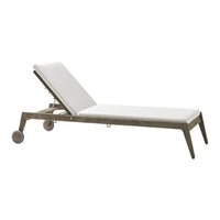 White reclining lounge chair with light gray frame and subtle texture. Ideal for outdoor relaxation.