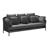 Black outdoor sofa with plush gray cushions, featuring a modern woven design for a sleek, stylish look.