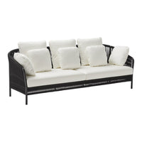 Black woven outdoor sofa with white cushions and matching throw pillows. Modern and stylish design for any patio.
