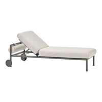 Light beige fabric chaise lounge with a sleek gray metal frame and minimalist design. Perfect for modern interiors.
