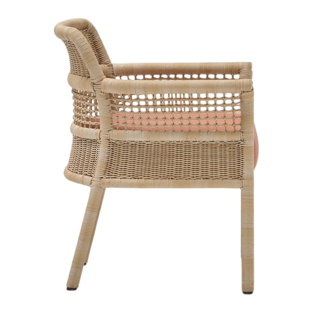 Beige woven chair with open weave design and soft coral cushioning. Elegant and modern aesthetic for indoor or outdoor use.
