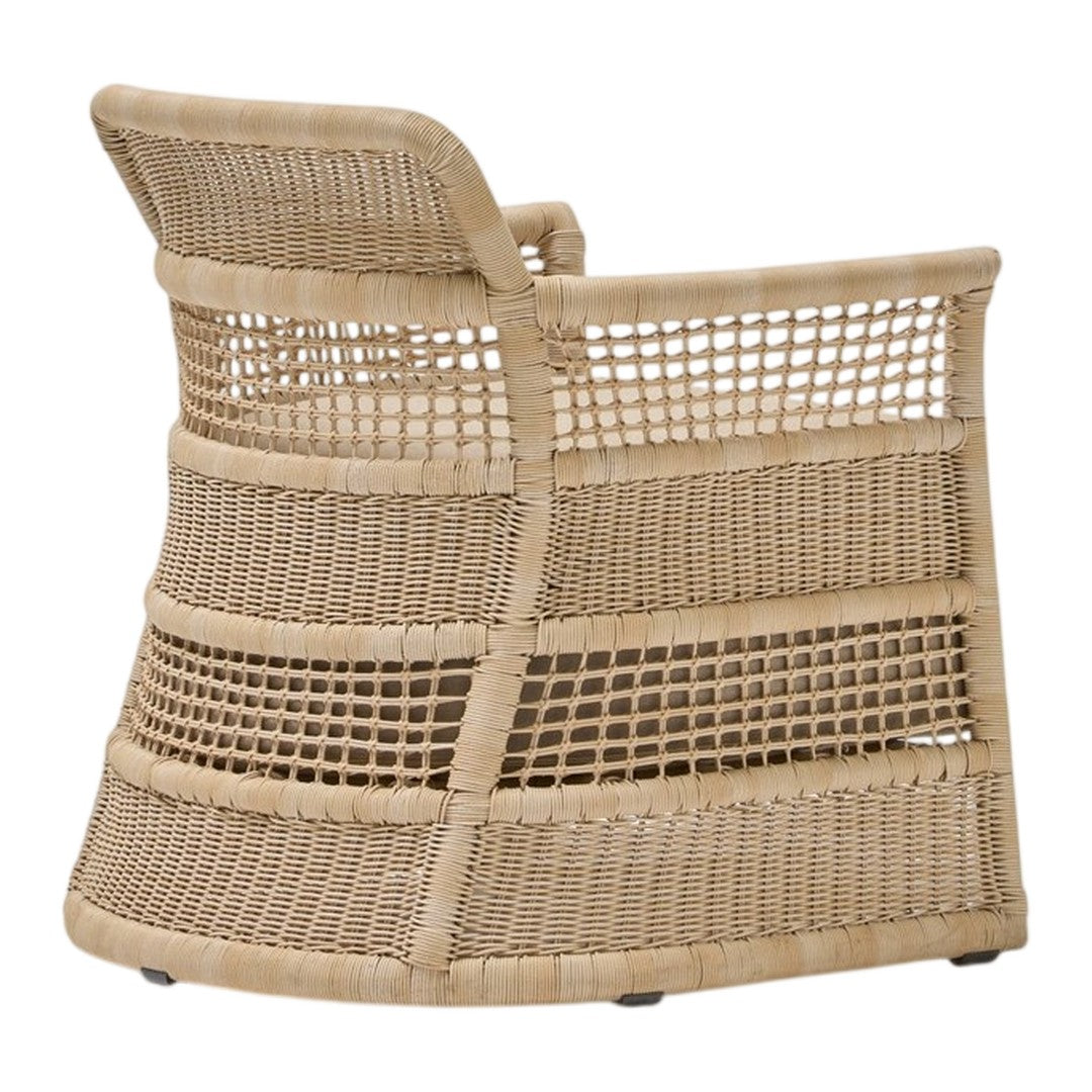 Woven beige armchair with geometric pattern and natural textures, perfect for a cozy living space.