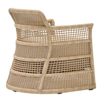 Woven beige armchair with geometric pattern and natural textures, perfect for a cozy living space.