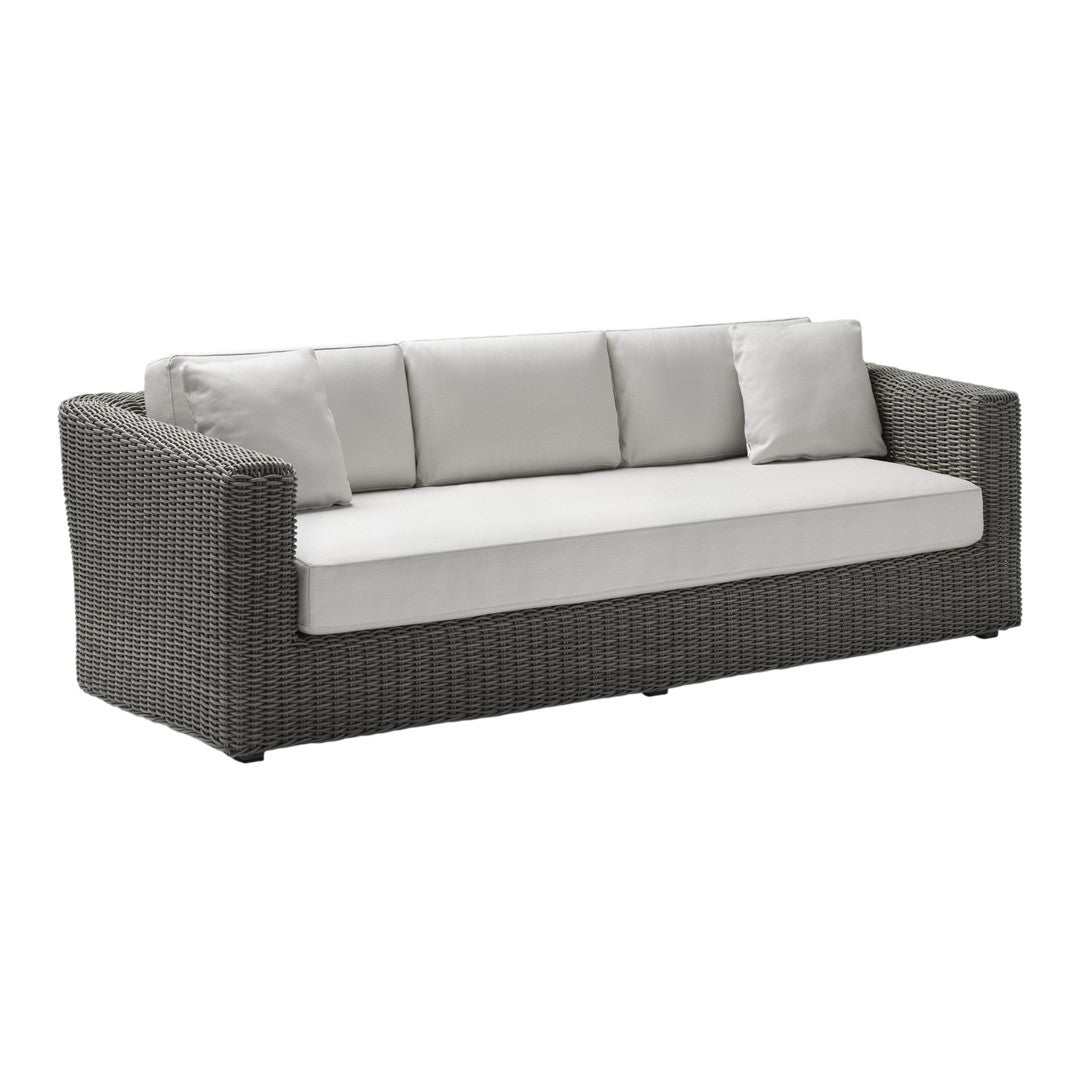 Gray wicker sofa with cream cushions, featuring a modern, minimalist design and clean lines. Perfect for outdoor spaces.
