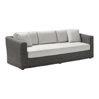 Gray wicker sofa with cream cushions, featuring a modern, minimalist design and clean lines. Perfect for outdoor spaces.