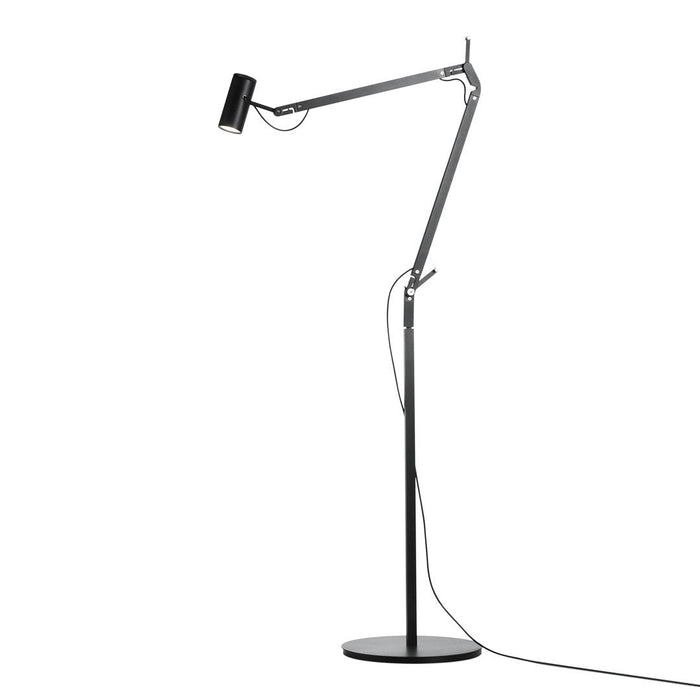 Sleek black floor lamp with a modern design and silver accents, featuring a minimalistic pattern and clean lines.