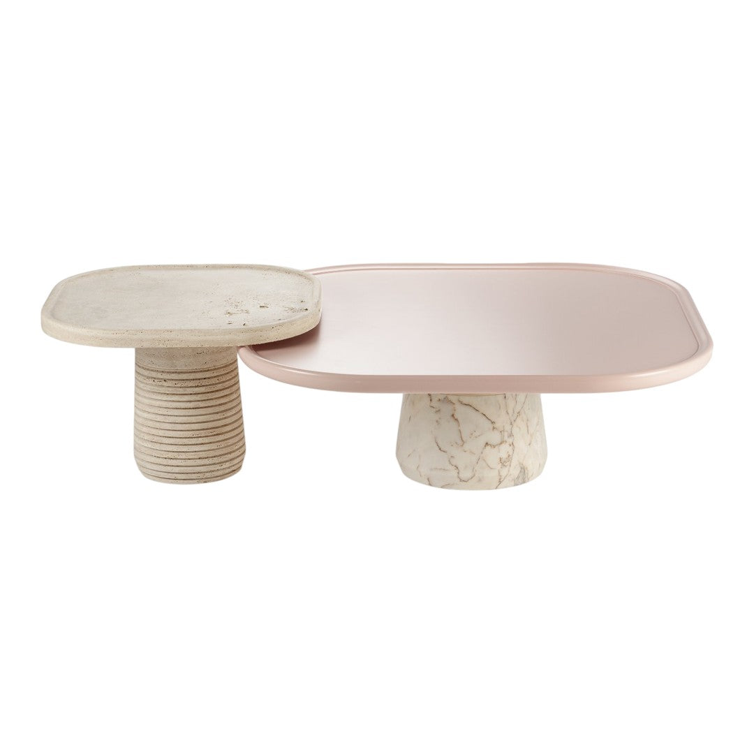 Pink and beige modern decorative trays, featuring smooth and textured surfaces with elegant shapes and subtle patterns.