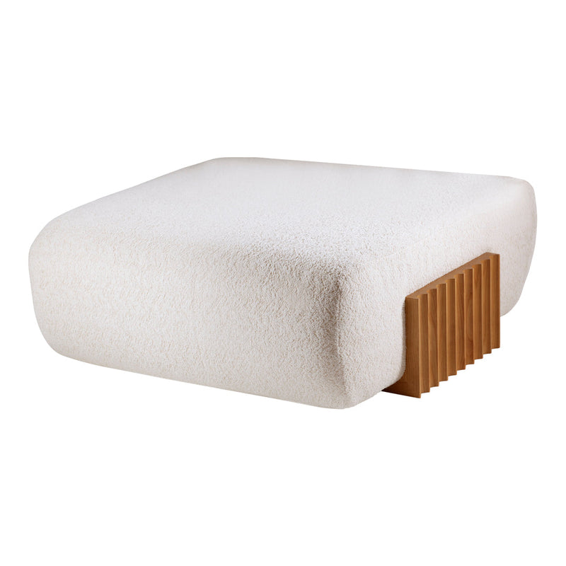 Cream textured fabric pouf with wooden slatted base. Clean, modern aesthetic for versatile decor.