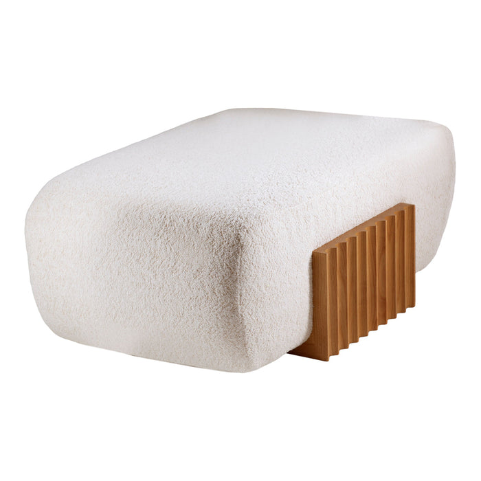 Cream textured upholstery with a warm wood accent in a modern, minimalist design. Soft, inviting color palette.