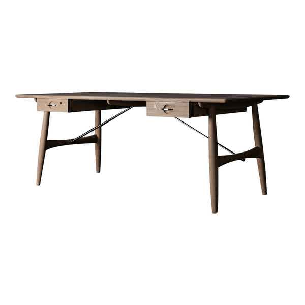Modern wooden desk in warm brown with a smooth finish and minimalist design, featuring two drawers.