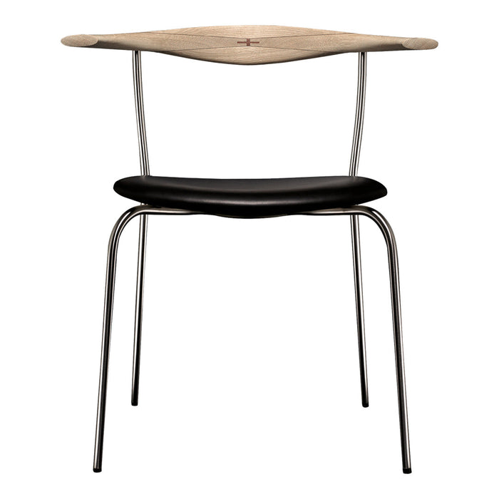 Modern chair featuring a natural wood top with a sleek black seat and shiny chrome legs for a minimalist look.
