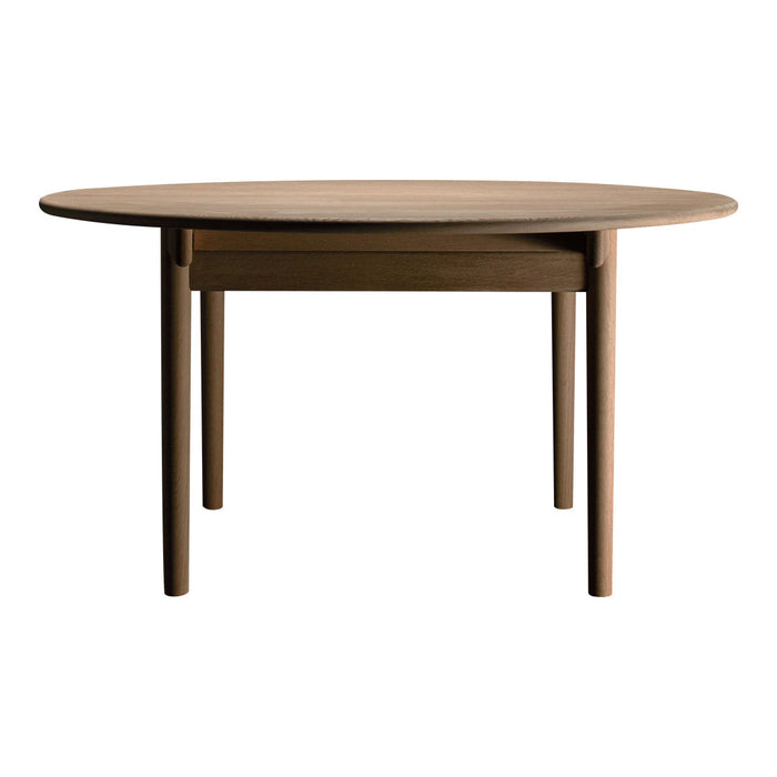 Round wooden dining table in rich brown finish with smooth surface and simple design, perfect for any decor.