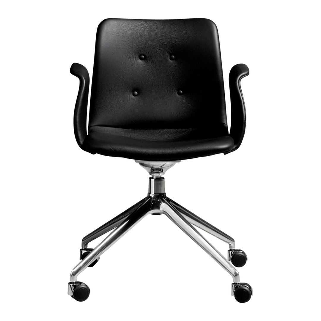 Black leather office chair with button tufting and chrome base, featuring a sleek, modern design.