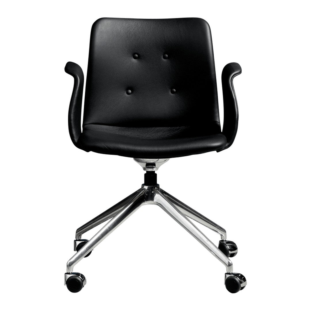 Black upholstered chair with a button-tufted design, featuring a sleek chrome base and rolling caster wheels.