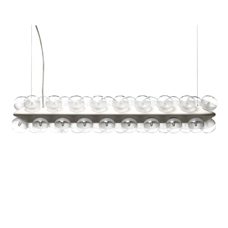 Sleek white pendant light with clear glass globe accents, showcasing a modern and minimalist design.