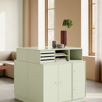 Light green modern storage cabinet with minimalist design, featuring smooth surfaces and subtle patterns.