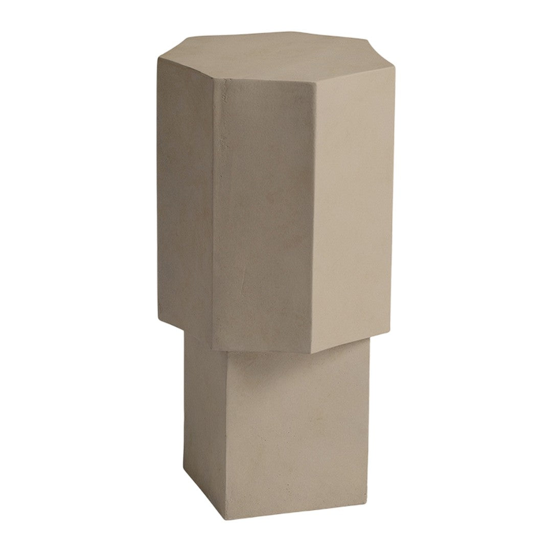 Beige octagonal pedestal table with minimalist geometric design, showcasing smooth, matte finish.