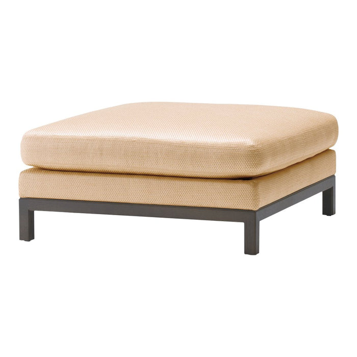 Beige upholstered ottoman with a smooth texture and a sleek black metal frame. Perfect for modern decor.