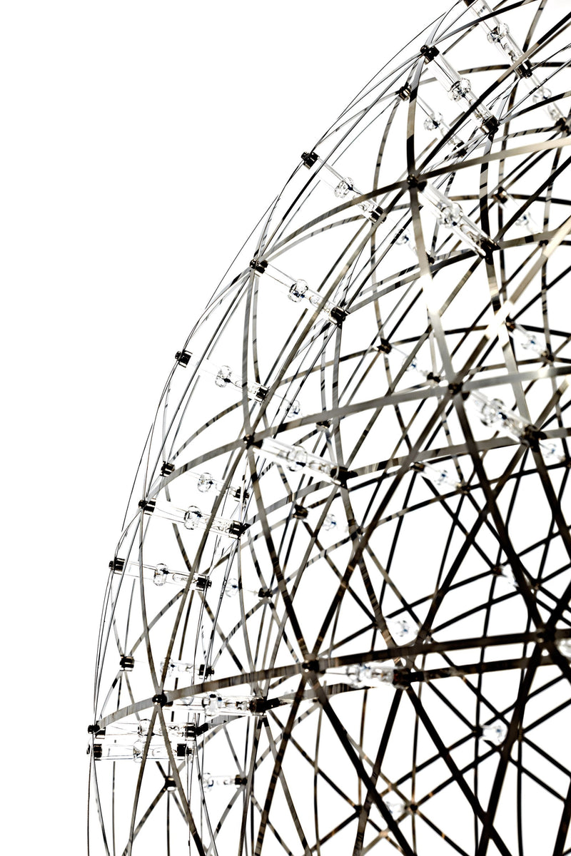 Geometric black and white wireframe globe with intricate patterns and bright accent lights. Modern design element.