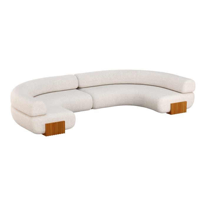 Curved, cream-colored sofa with a textured fabric and wooden accents. Modern minimalist design with soft lines.