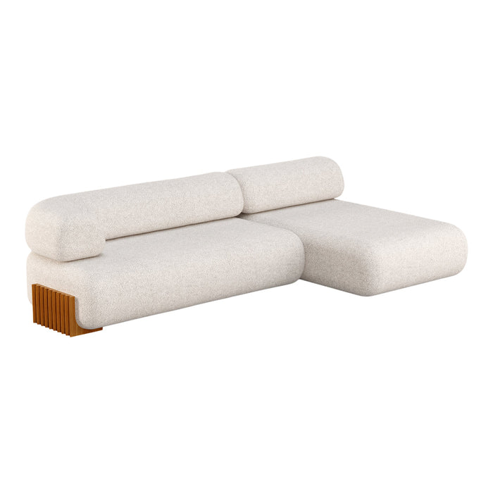 Beige, textured fabric sectional sofa with rounded edges and a wooden accent base. Modern and minimalist design.