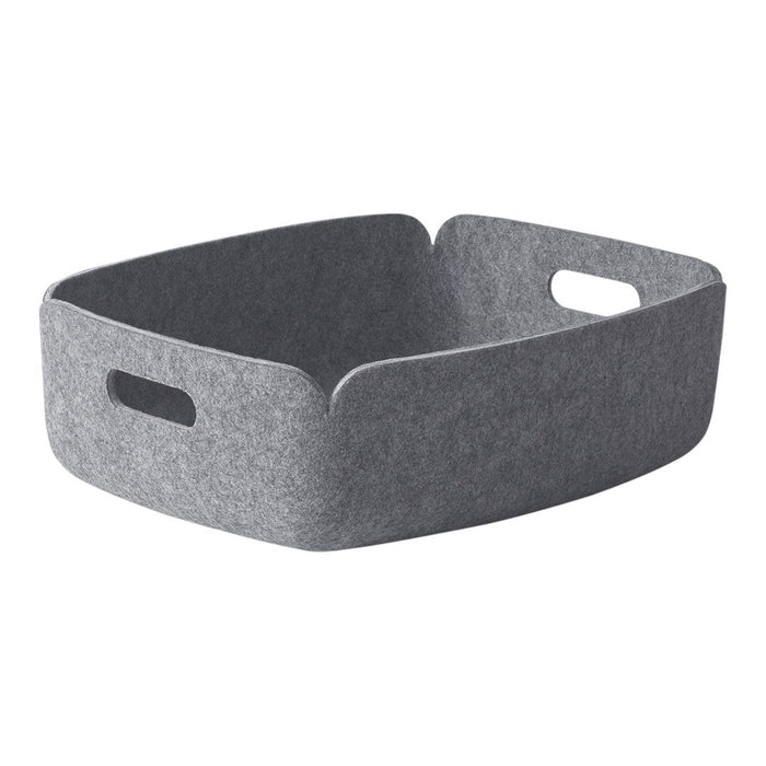 Gray felt storage basket with a minimalist design and subtle texture. Perfect for organizing any space.