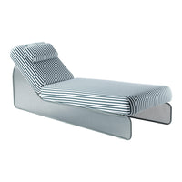 Striped chaise lounge in black and white with a sleek, modern design and padded headrest for comfort.