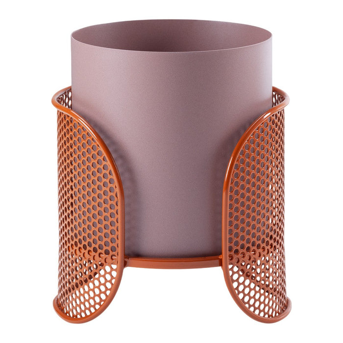 Lavender cylindrical planter with an orange perforated metal base, offering a modern and stylish contrast in colors.