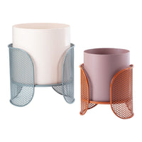 Set of two modern planters featuring pastel pink and lavender pots with mesh metal holders in blue and orange.