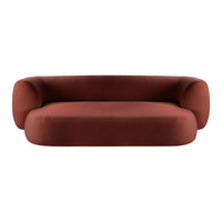 Rust-colored upholstered sofa with a smooth, rounded design and modern minimalist shape.