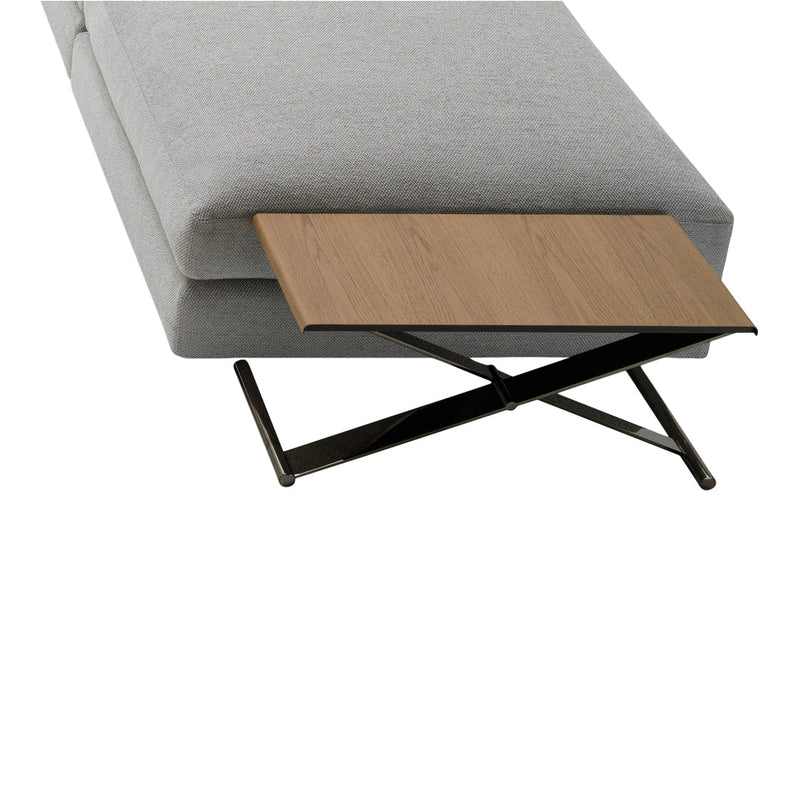 Gray fabric chaise lounge with a wooden tabletop and black metal base, featuring a sleek, modern design.