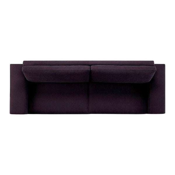 "Dark purple fabric sofa with smooth, modern design and relaxed cushions, ideal for contemporary living spaces."