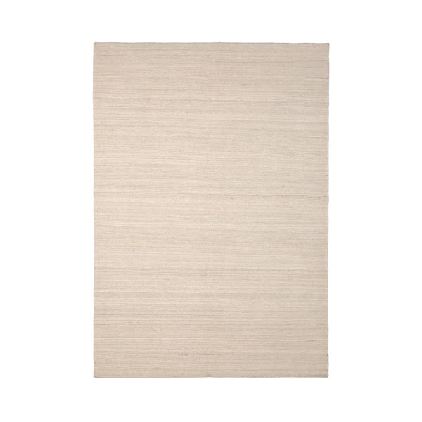 Neutral beige area rug with subtle woven texture and light, understated pattern. Perfect for enhancing any decor.