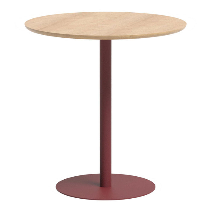 Round wooden table with a natural wood top and a burgundy metal base, featuring a minimalist design.