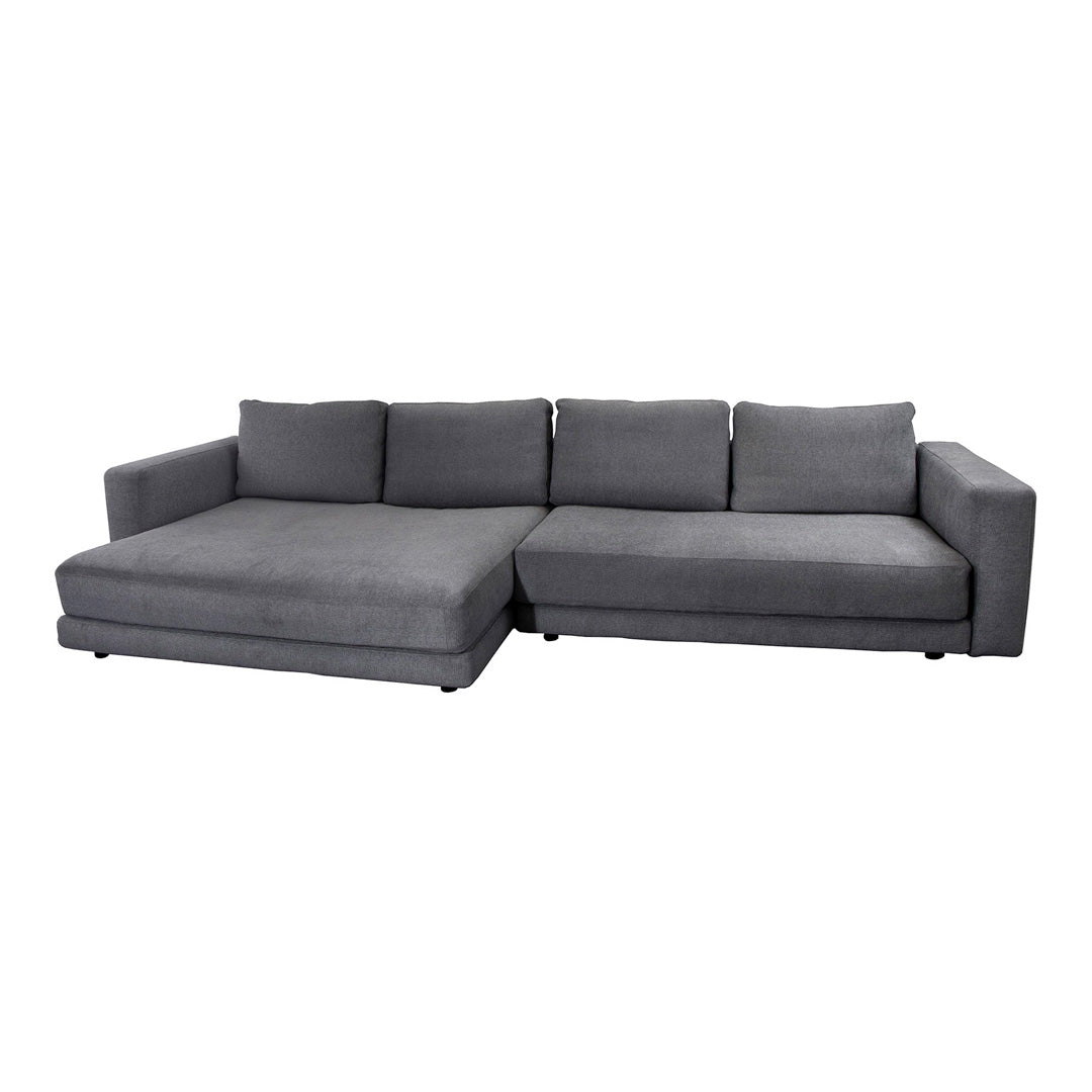 Gray sectional sofa with a smooth fabric finish and minimalist design, perfect for modern living spaces.