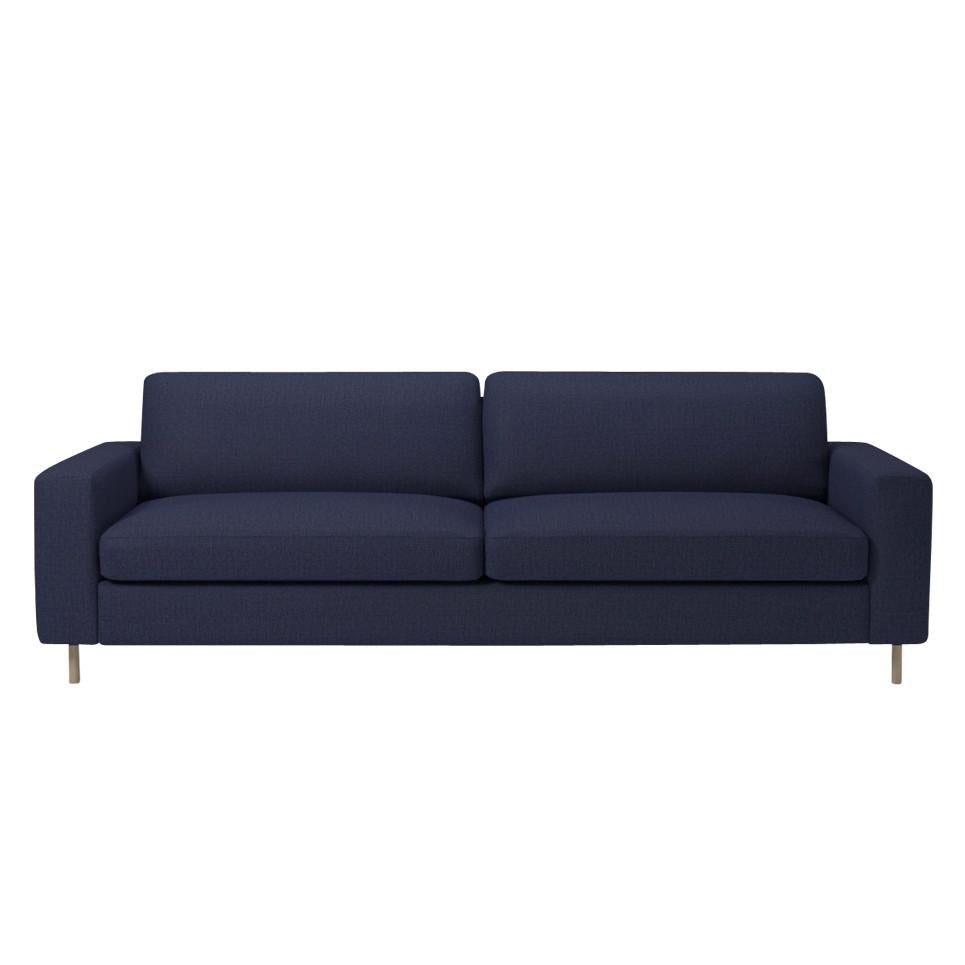 Navy blue upholstered sofa with sleek, modern design and no visible patterns.