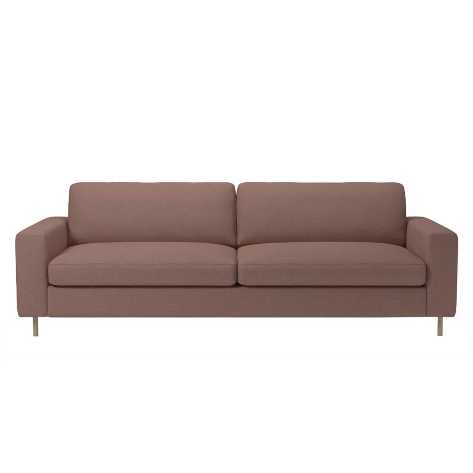 Modern two-seat sofa in a soft mauve hue with a minimalist design and smooth fabric texture.