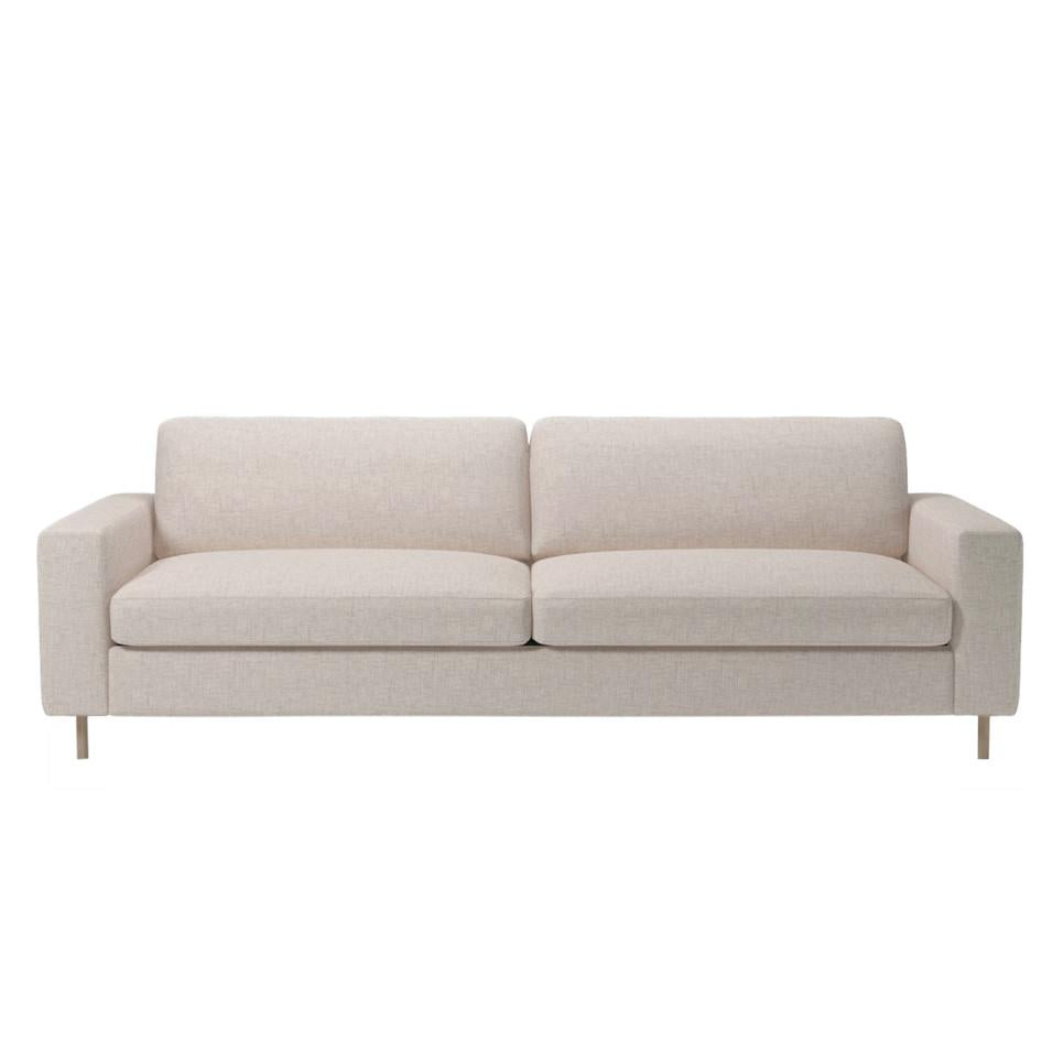 Light beige modern sofa with a textured fabric and minimalist design, featuring straight lines and no patterns.