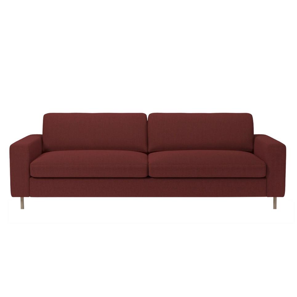 Rich burgundy sofa with a smooth, textured fabric and minimalist design, featuring clean lines and silver legs.