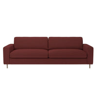 Rich burgundy sofa with a smooth, textured fabric and minimalist design, featuring clean lines and silver legs.