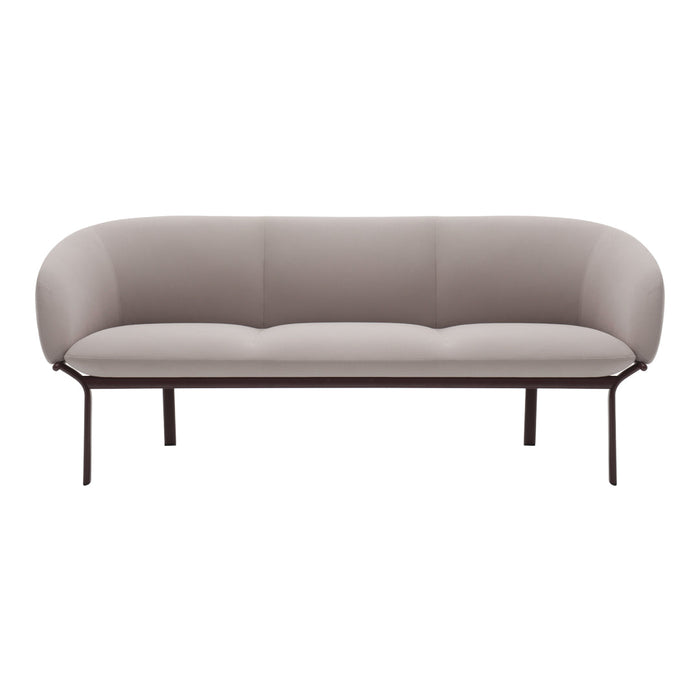 Elegant light beige sofa with a smooth, minimalist design and dark metal legs. Perfect for modern decor.