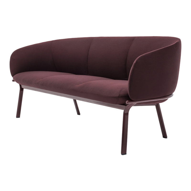 Plum-colored sofa with a sleek design and smooth, modern upholstery. Elegant curved shape enhances any space.