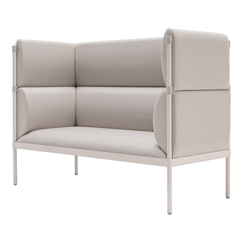 Neutral beige plush sofa with smooth, curved patterns and sleek metal legs for a modern aesthetic.