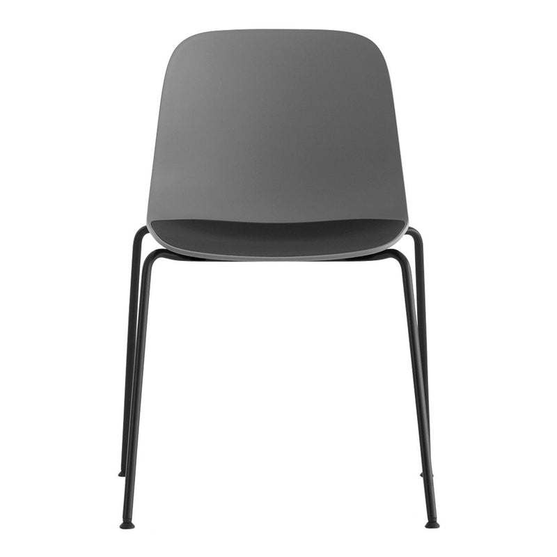 Minimalist gray chair with a smooth surface and sleek black metal legs, perfect for modern decor.