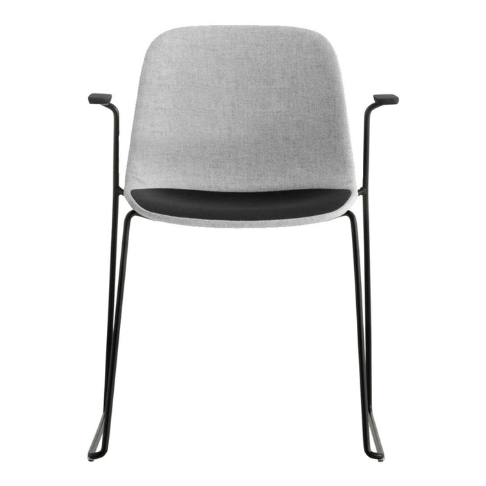 Gray upholstered chair with a sleek black metal frame, featuring a minimalist design and solid colors.