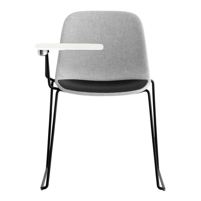Gray upholstered chair with a sleek black frame and a white armrest, featuring a minimalist design.