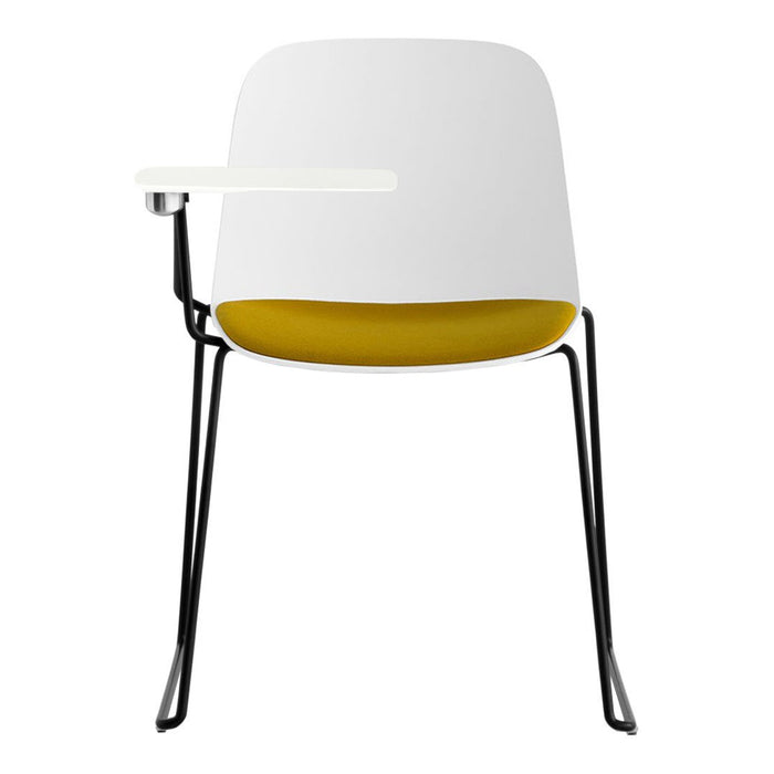 Modern chair featuring a white shell, vibrant yellow interior, and sleek black legs with a minimalist design.