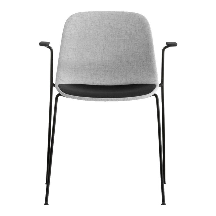 Gray upholstered chair with black metal legs and a sleek, minimalist design, perfect for modern interiors.