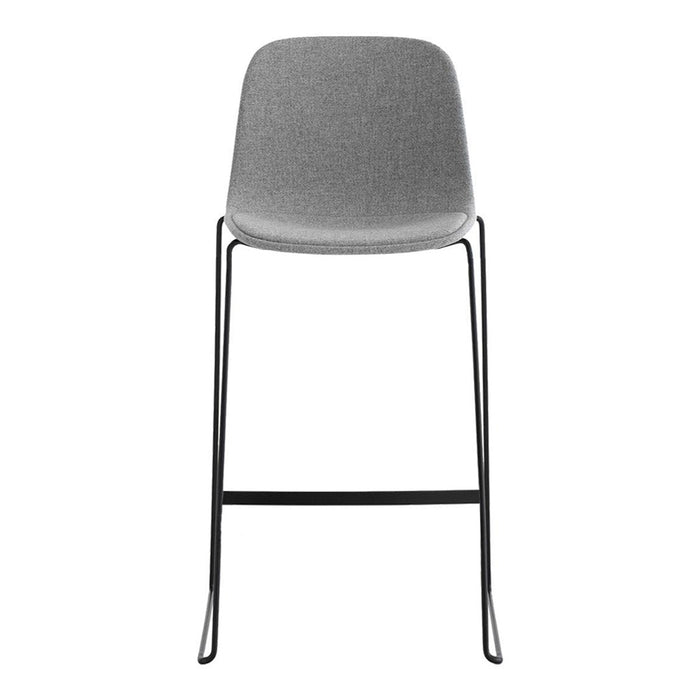 Gray upholstered bar stool with sleek black metal legs, featuring a minimalist design and smooth, clean lines.