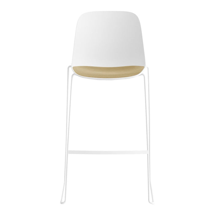 White and light wood bar stool with a sleek modern design and minimalistic patterns.